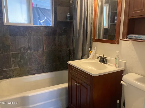 a bathroom with a sink and a bathtub