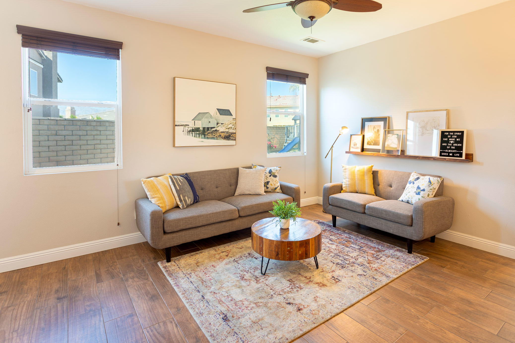 37196 Sandwell Street Indio, CA 92203 - Photo 12 of 34 a living room with furniture and a wooden floor