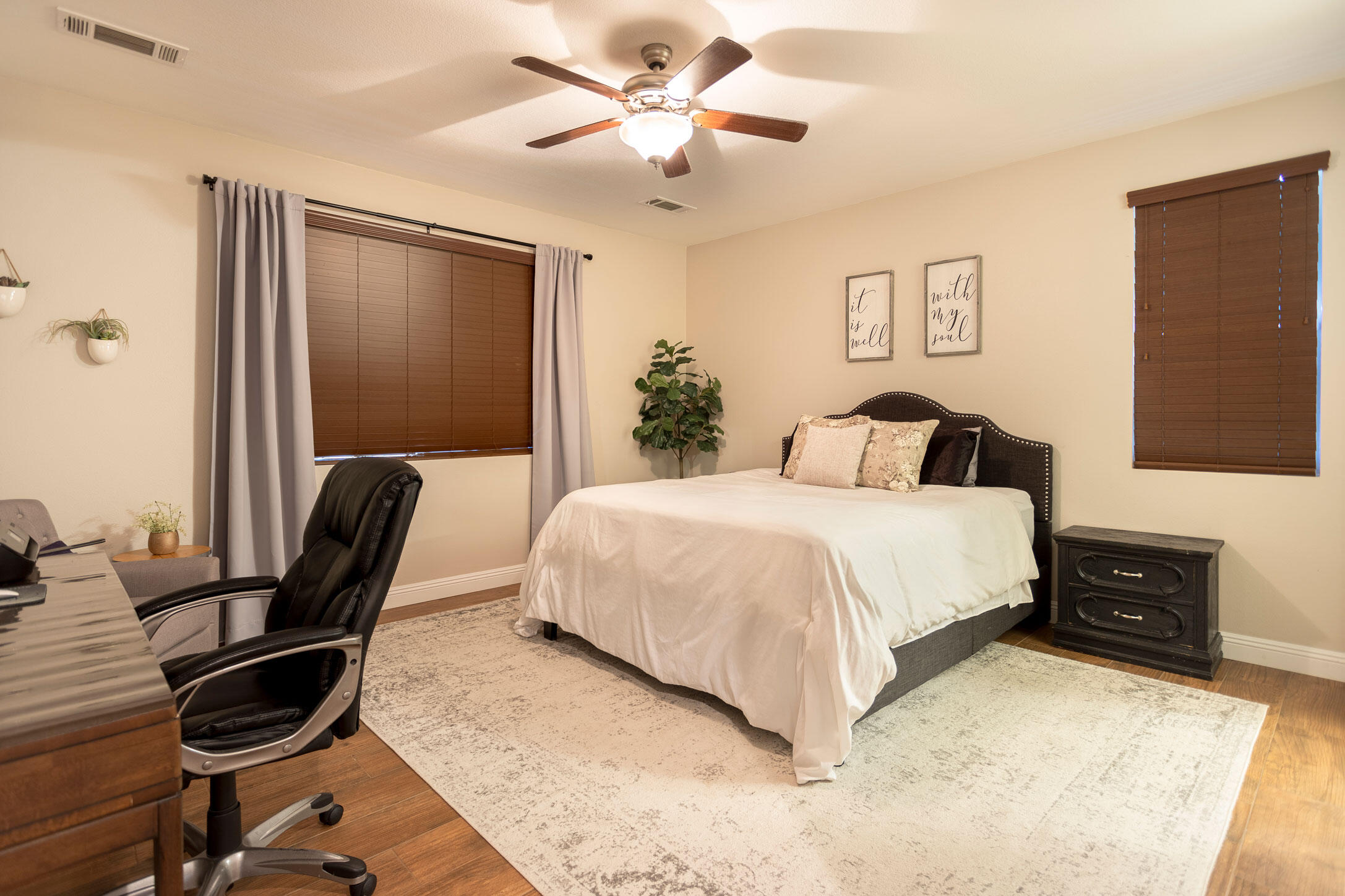 37196 Sandwell Street Indio, CA 92203 - Photo 13 of 34 a bedroom with a bed and furniture