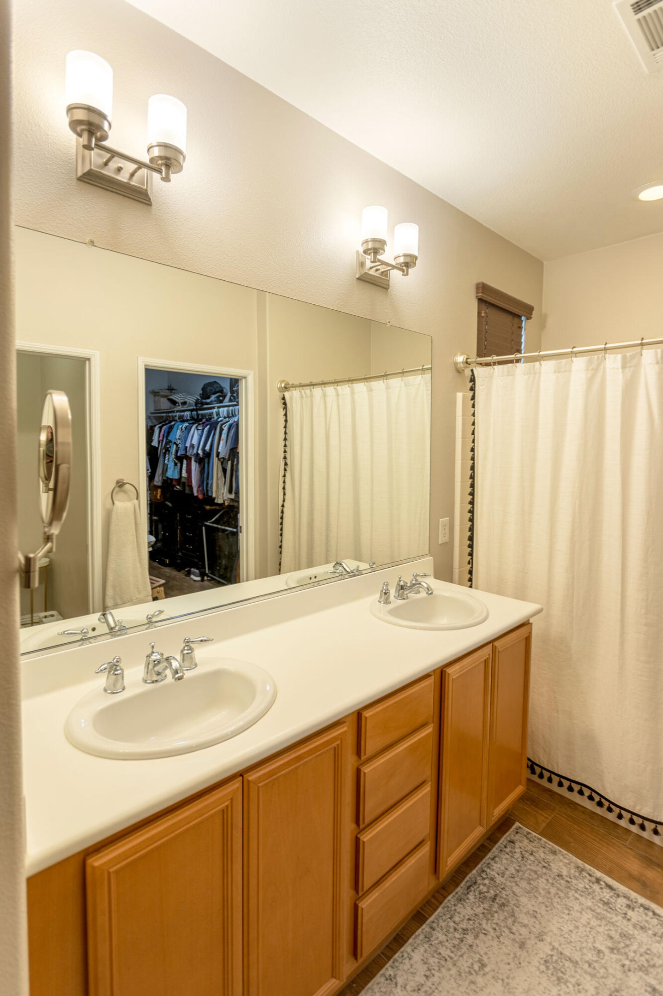 37196 Sandwell Street Indio, CA 92203 - Photo 15 of 34 a bathroom with a sink and a mirror