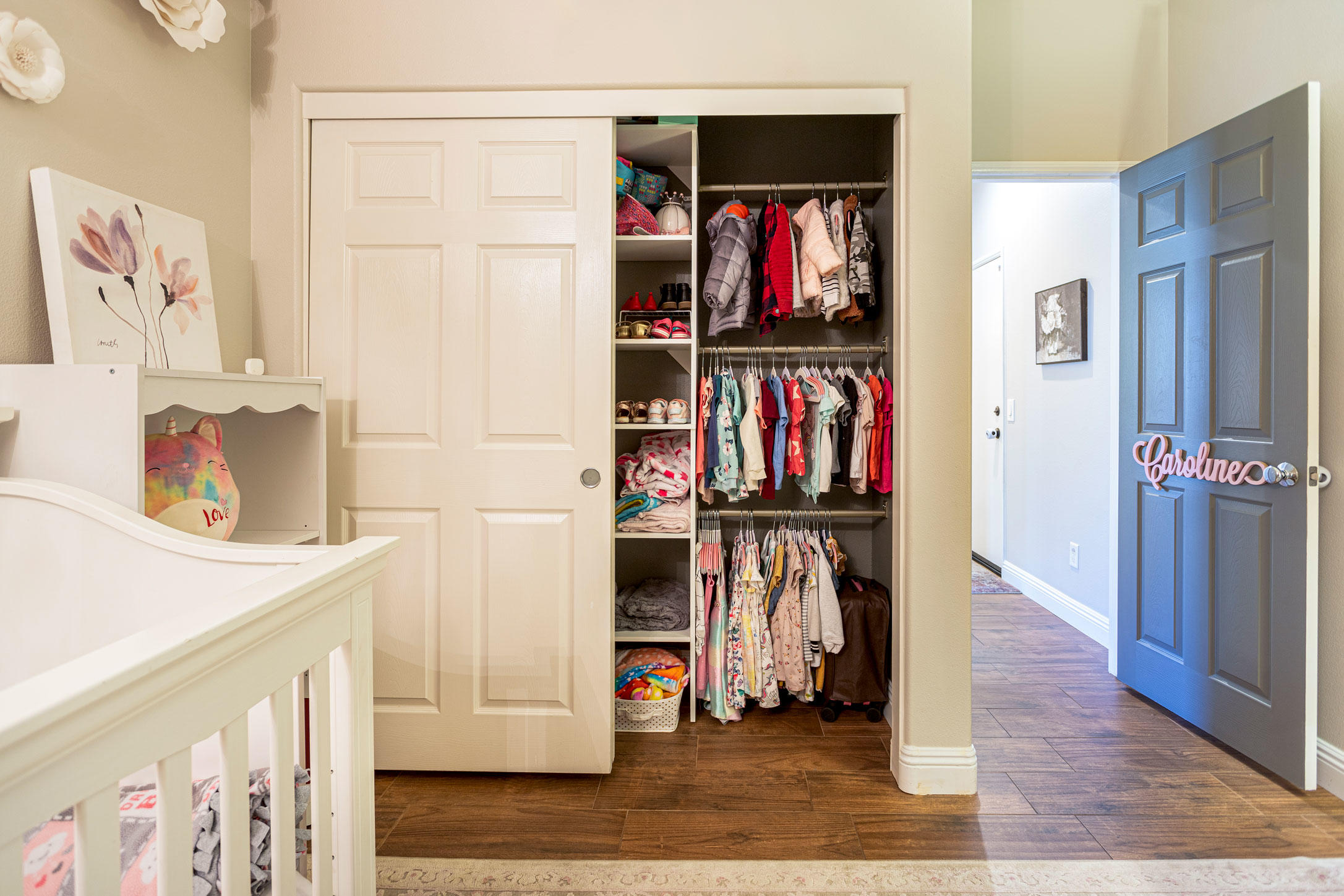 37196 Sandwell Street Indio, CA 92203 - Photo 21 of 34 a view of a hallway with wooden floor and closet