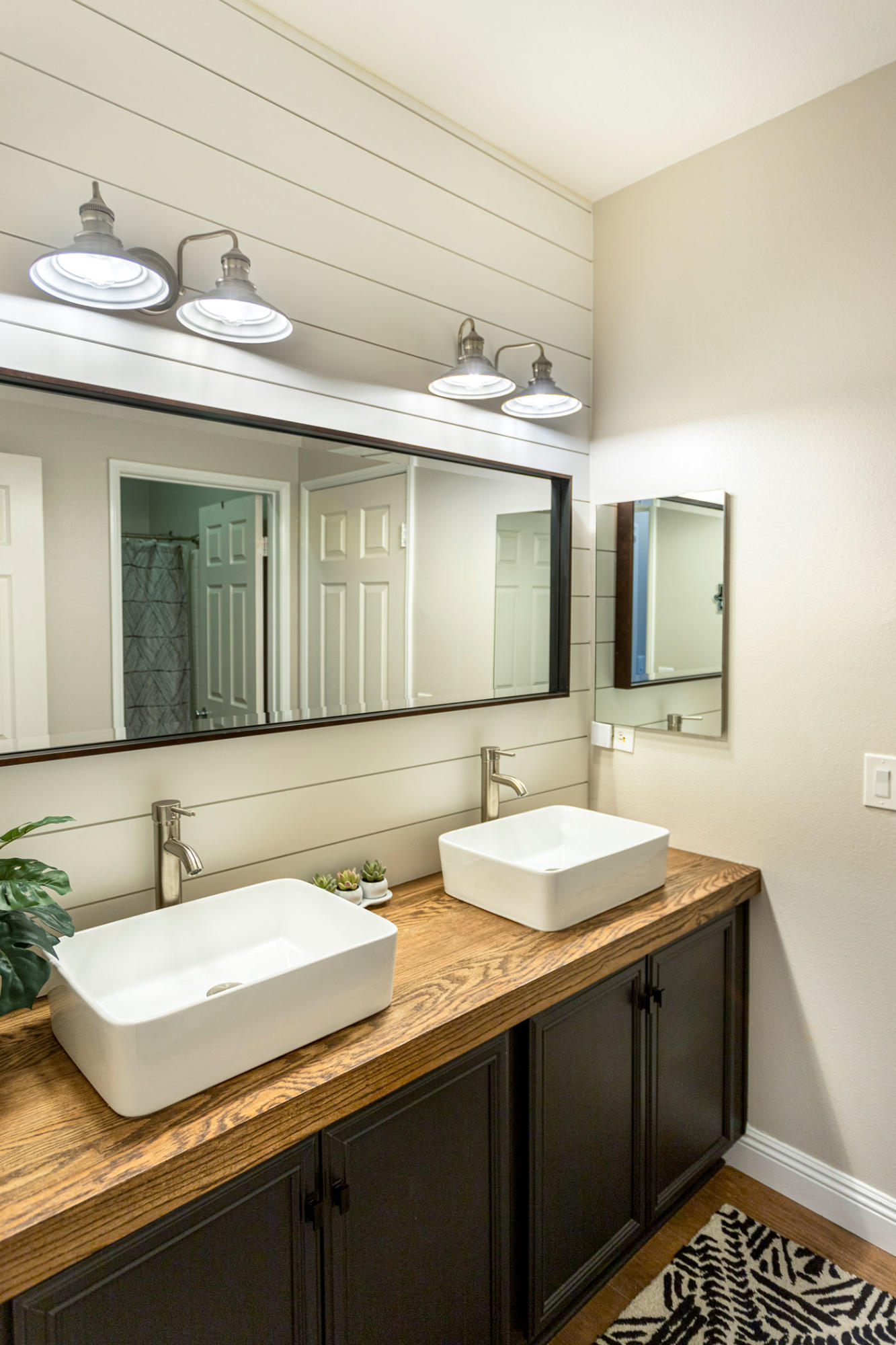 37196 Sandwell Street Indio, CA 92203 - Photo 27 of 34 a bathroom with a sink and a mirror