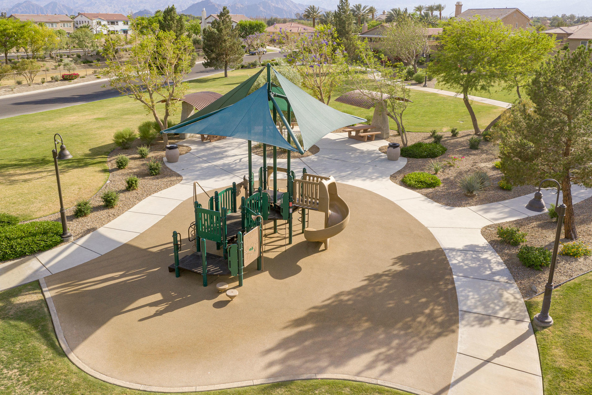 37196 Sandwell Street Indio, CA 92203 - Photo 33 of 34 a view of a swimming pool with a patio