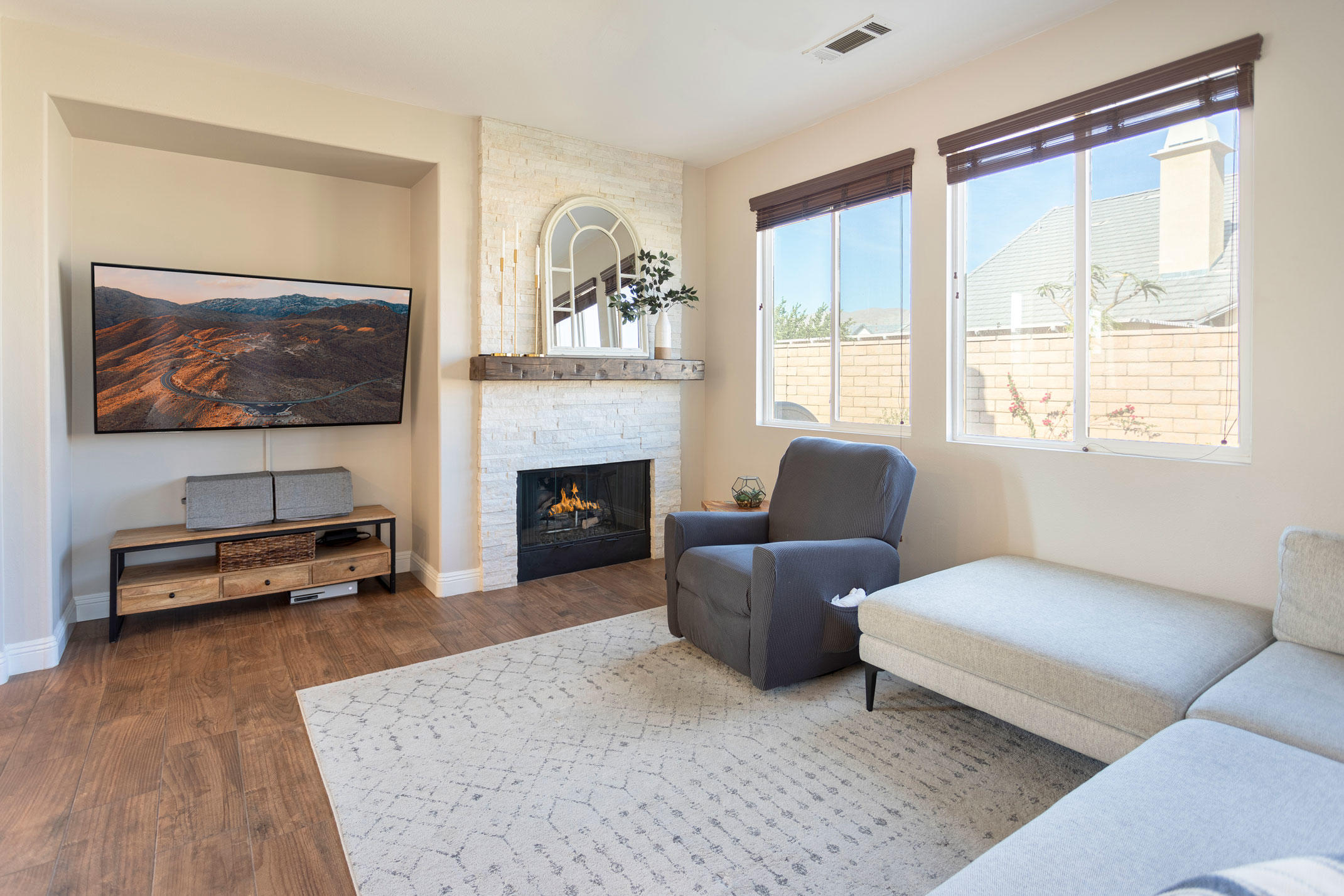37196 Sandwell Street Indio, CA 92203 - Photo 7 of 34 a living room with furniture and a fireplace