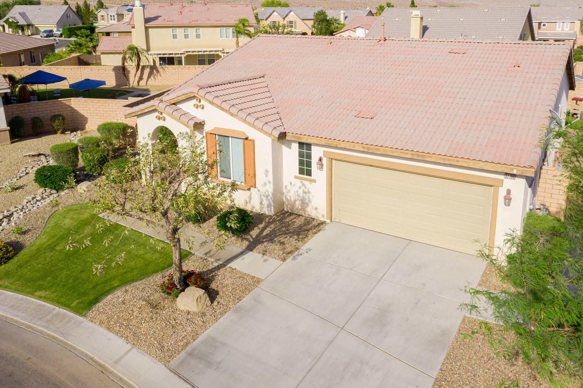 37196 Sandwell Street Indio, CA 92203 - Photo 8 of 34 a view of a backyard with plants