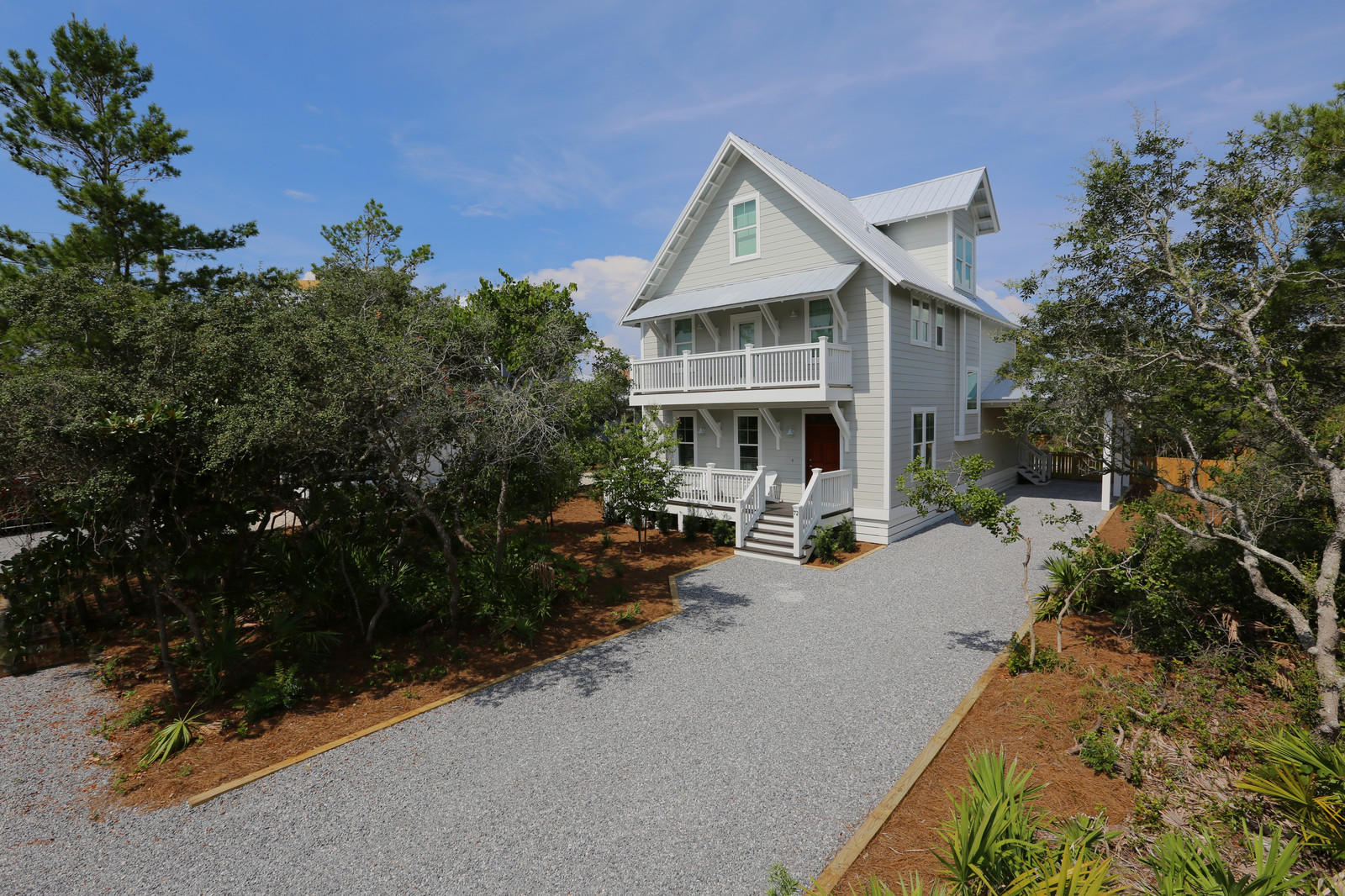 72 Gulf Point Road Santa Rosa Beach, FL 32459 - Photo 3 of 47 a view of a house with sitting area and garden