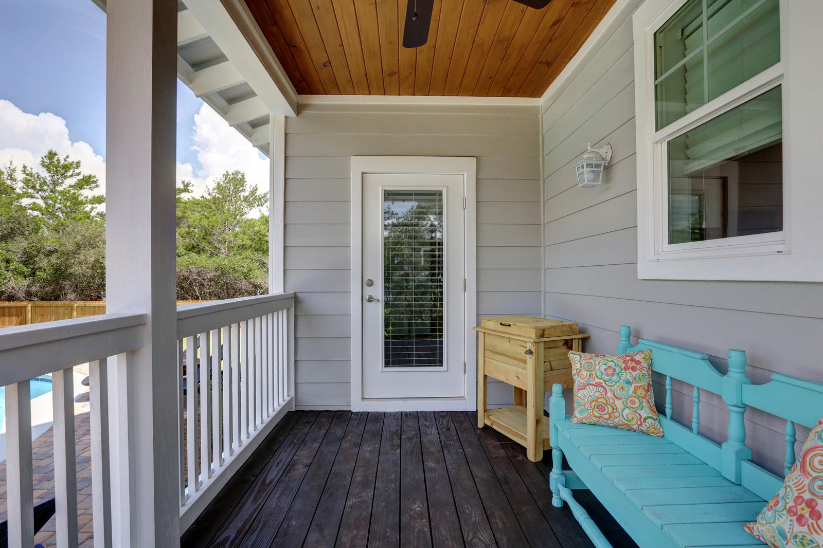 72 Gulf Point Road Santa Rosa Beach, FL 32459 - Photo 21 of 47 a view of a deck with wooden floor and a fireplace