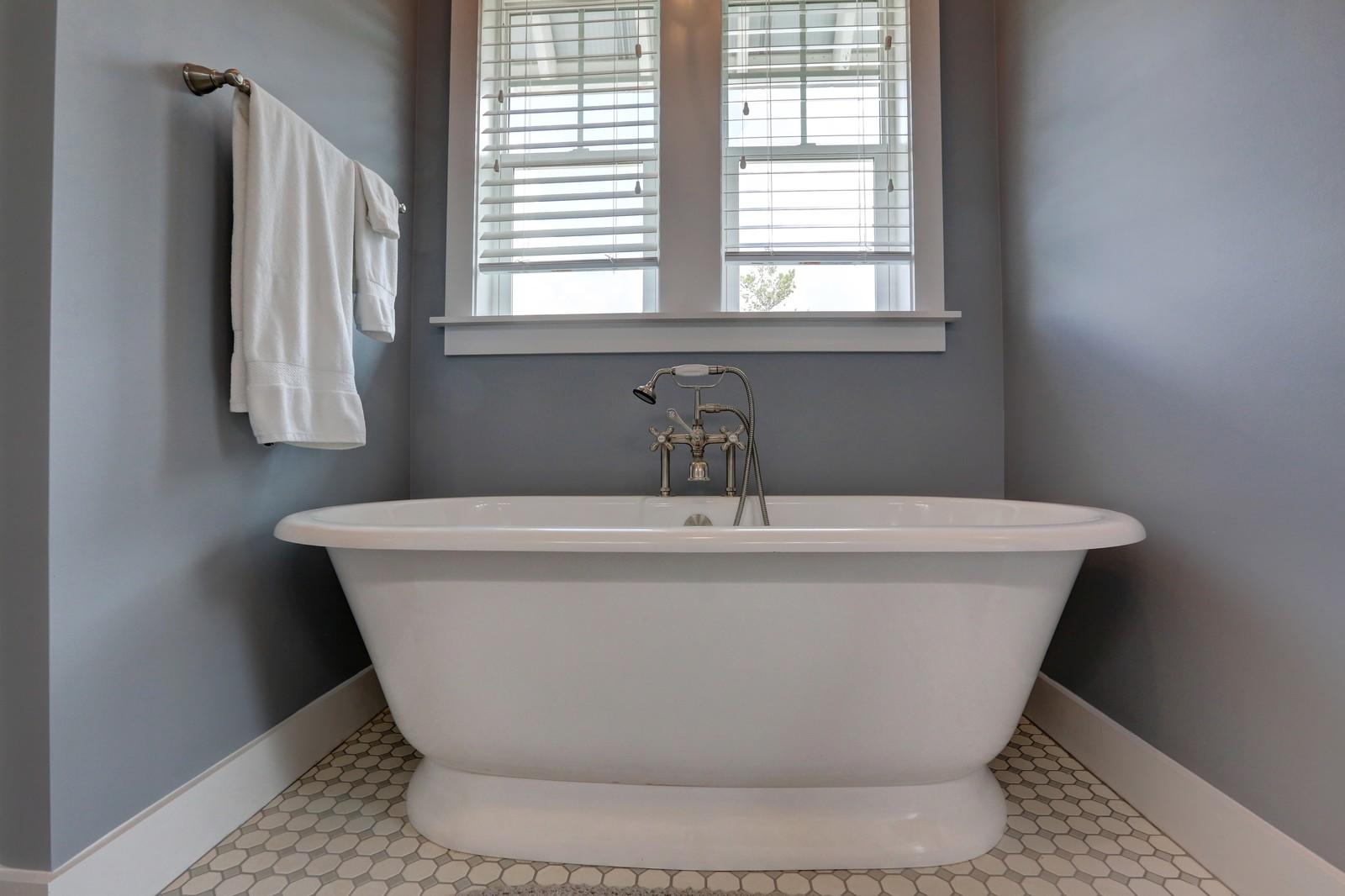 72 Gulf Point Road Santa Rosa Beach, FL 32459 - Photo 29 of 47 a white bath tub sitting in a bathroom