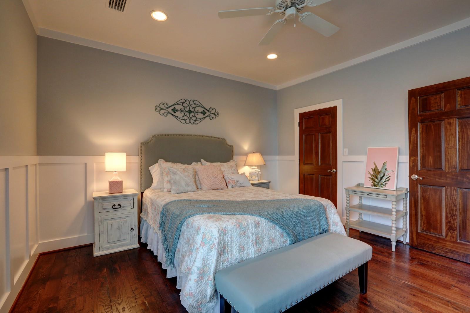 72 Gulf Point Road Santa Rosa Beach, FL 32459 - Photo 35 of 47 a bedroom with a bed and wooden floor