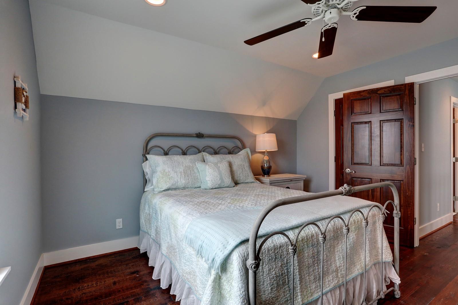 72 Gulf Point Road Santa Rosa Beach, FL 32459 - Photo 37 of 47 a bedroom with a bed and wooden floor