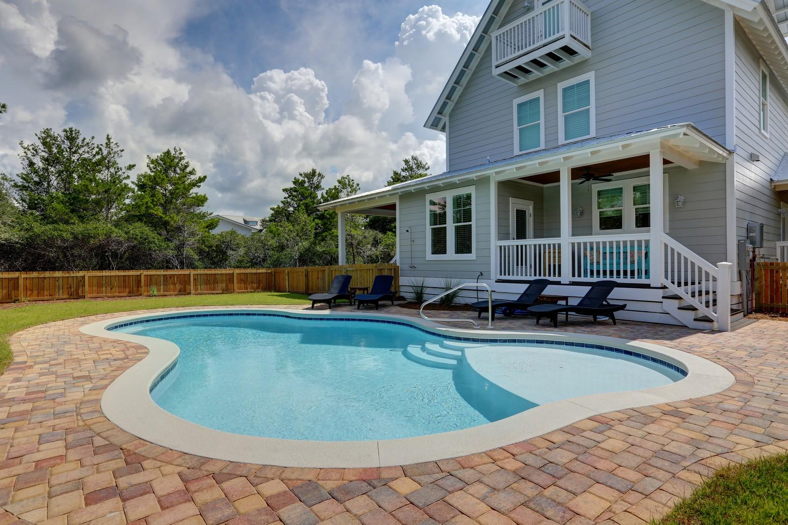 72 Gulf Point Road Santa Rosa Beach, FL 32459 - Photo 8 of 47 a view of a house with swimming pool and sitting area
