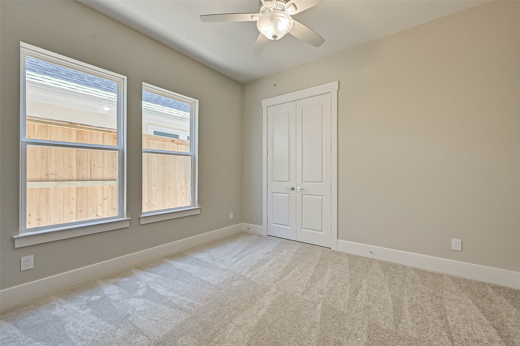 67 Thorpe Lane Spring, TX 77389 - Photo 5 of 27 an empty room with chandelier fan
