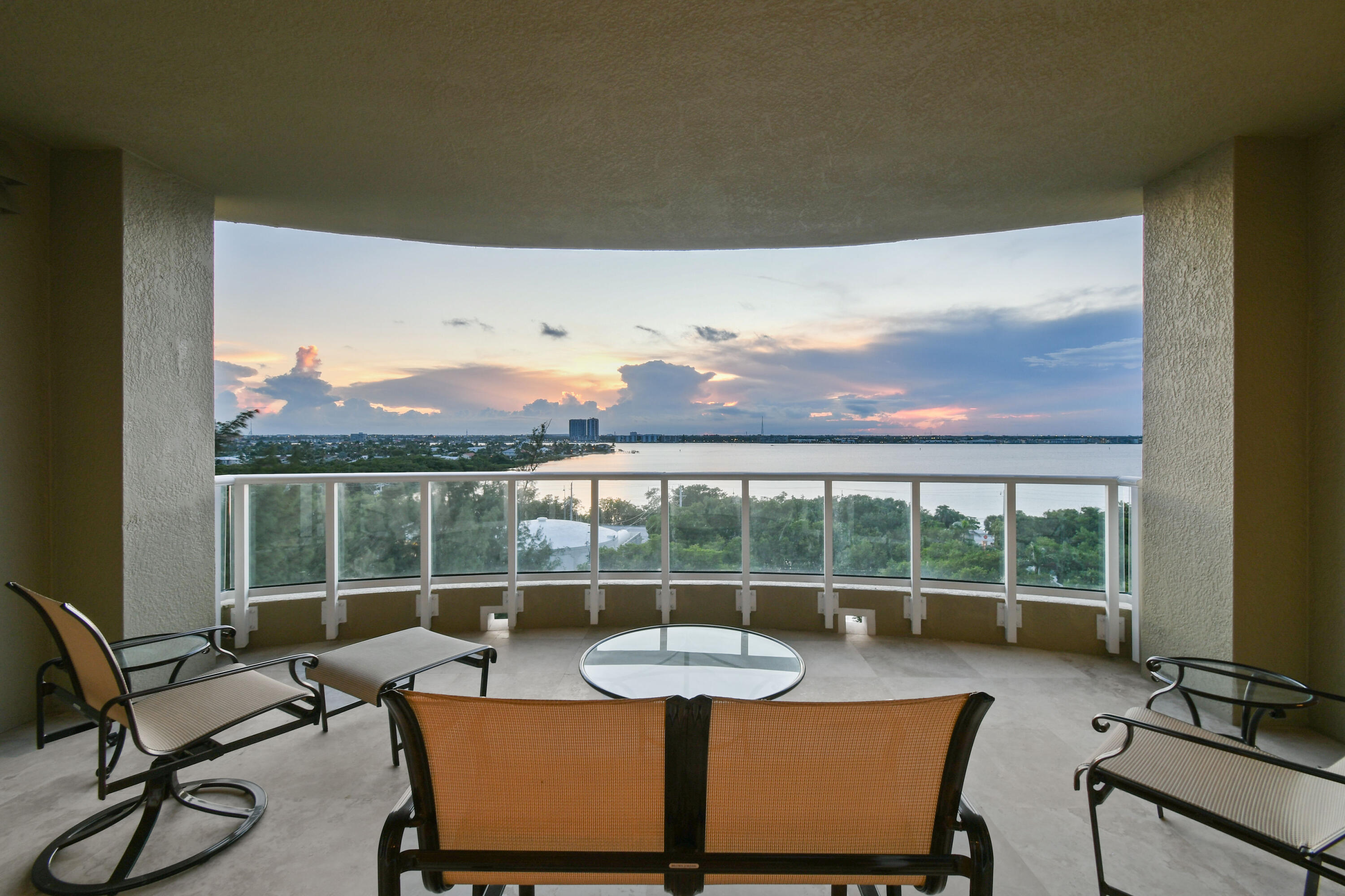 5050 North Ocean Drive, Unit 703 Singer Island, FL 33404 - Photo 23 of 52 a view of a chairs and table in a balcony