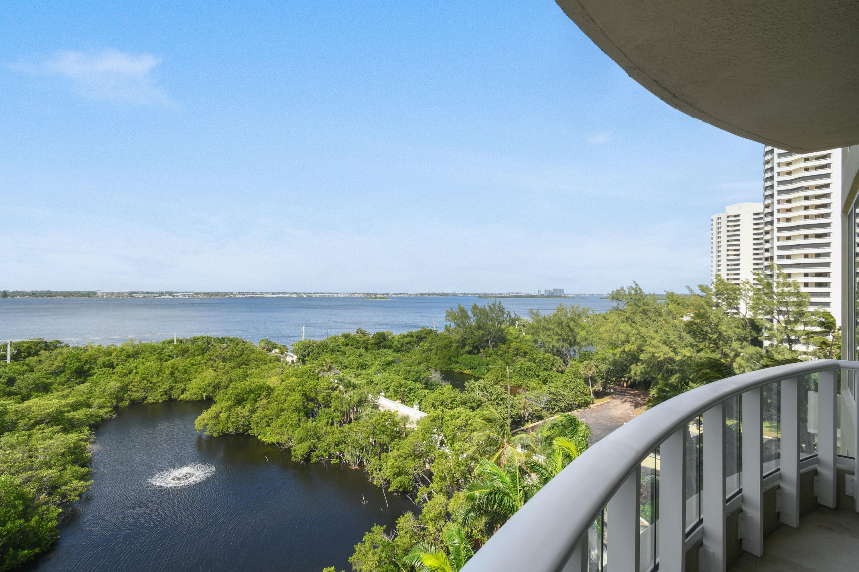 5050 North Ocean Drive, Unit 703 Singer Island, FL 33404 - Photo 24 of 52 a city view with tall trees