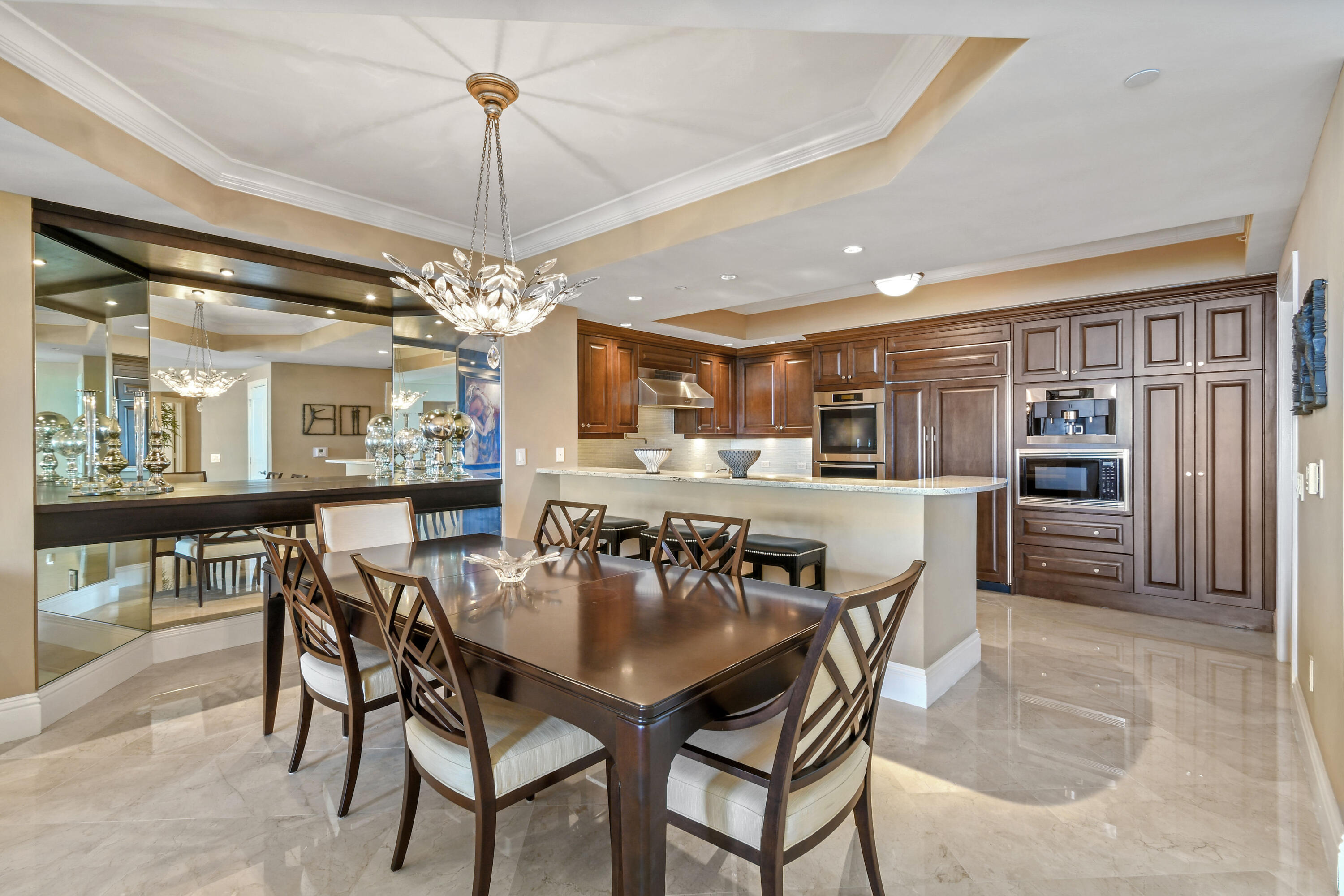 5050 North Ocean Drive, Unit 703 Singer Island, FL 33404 - Photo 6 of 52 a dining room with furniture and window