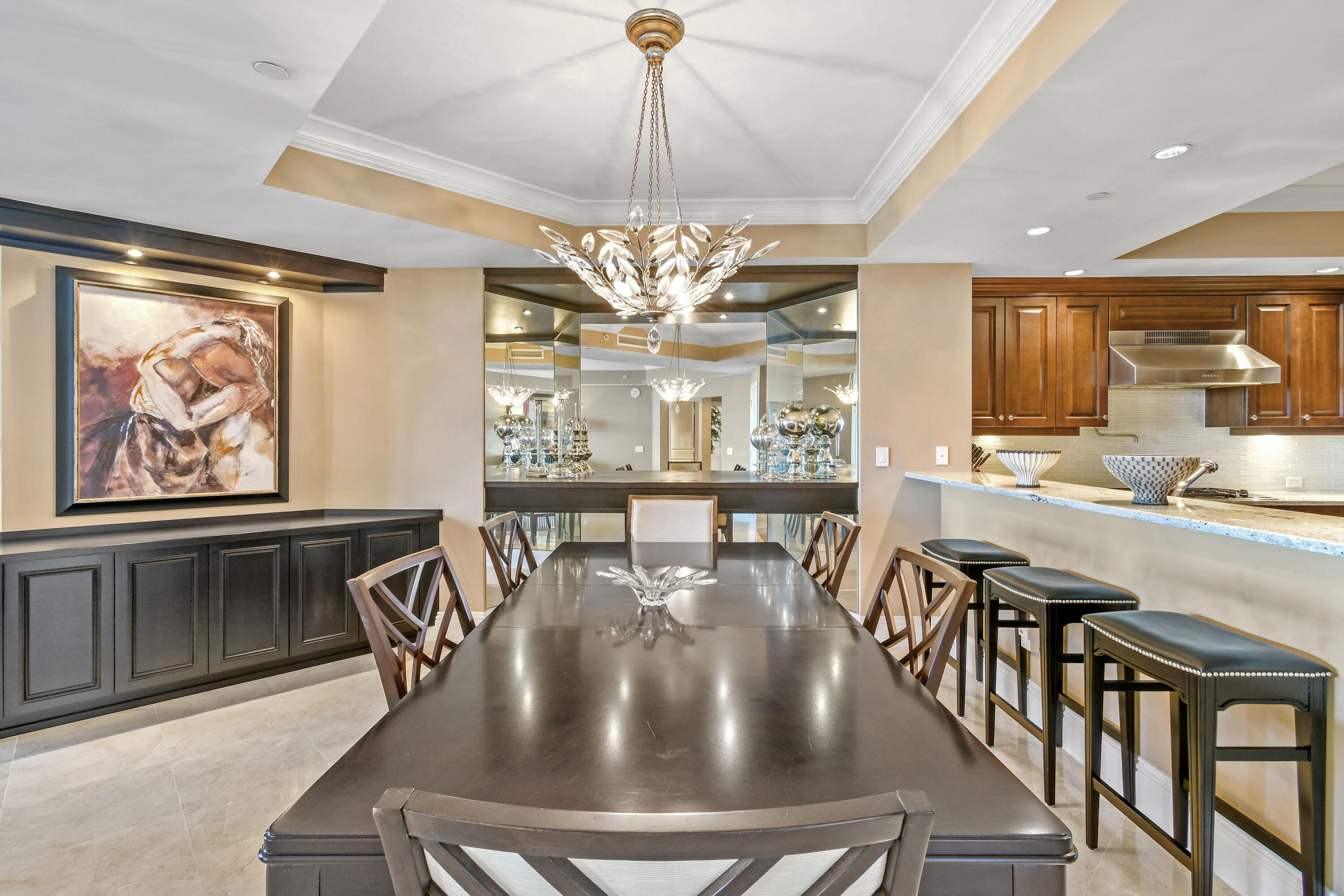 5050 North Ocean Drive, Unit 703 Singer Island, FL 33404 - Photo 7 of 52 a view of a dining room with furniture window and outside view