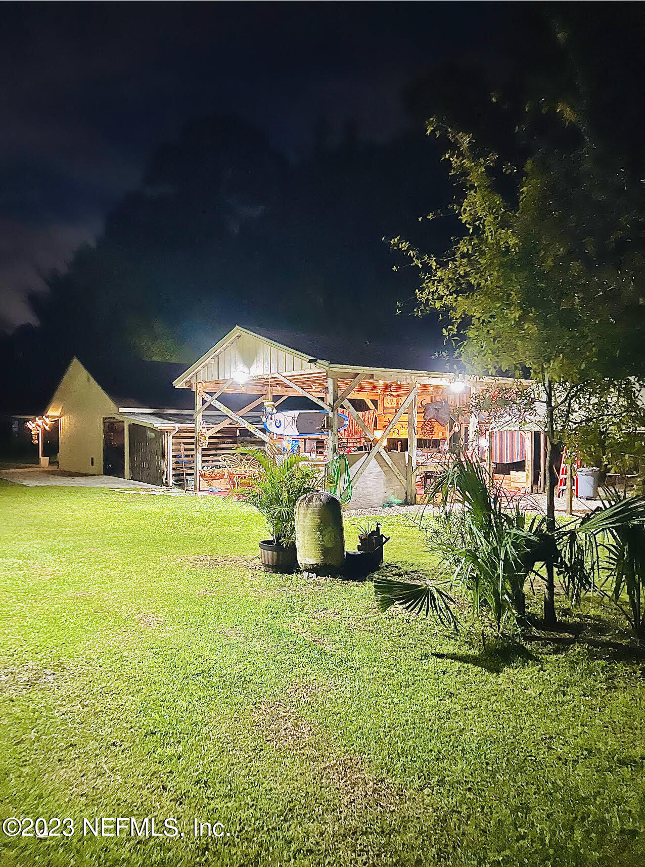 7028 Jammes Road Jacksonville, FL 32244 - Photo 38 of 44 Social gathering area nightime 2