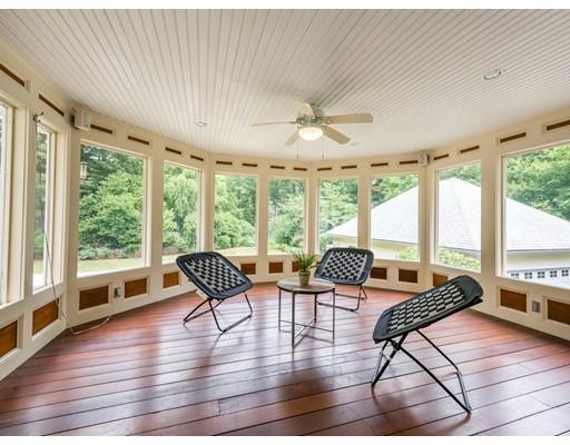 52 Crestview Road Milton, MA 02186 - Photo 13 of 25 a living room with furniture and a large window