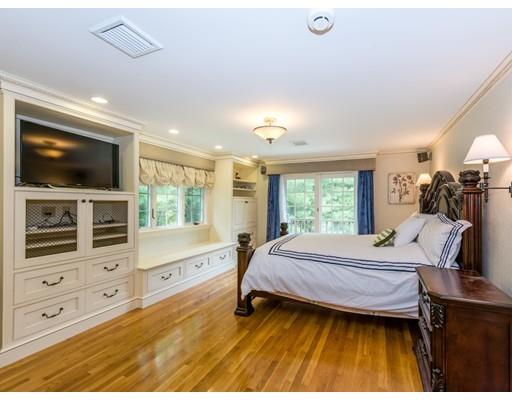 52 Crestview Road Milton, MA 02186 - Photo 15 of 25 a bedroom with furniture and flat screen tv