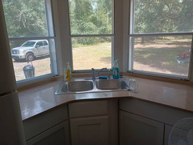 a view of a window with a sink