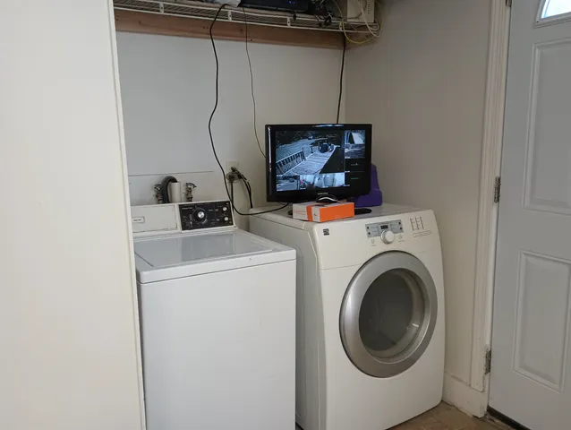a utility room with dryer and washer