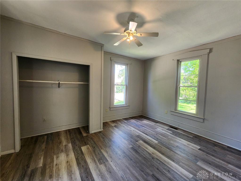 211 Race Street Spring Valley, OH 45370 - Photo 9 of 12 This bright room features durable flooring and ample natural light, creating a comfortable living space.
