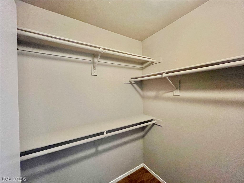 7885 West Flamingo Road, Unit 1029 Las Vegas, NV 89147 - Photo 15 of 18 Ample shelving and hanging space offer practical organization within this well-proportioned closet.