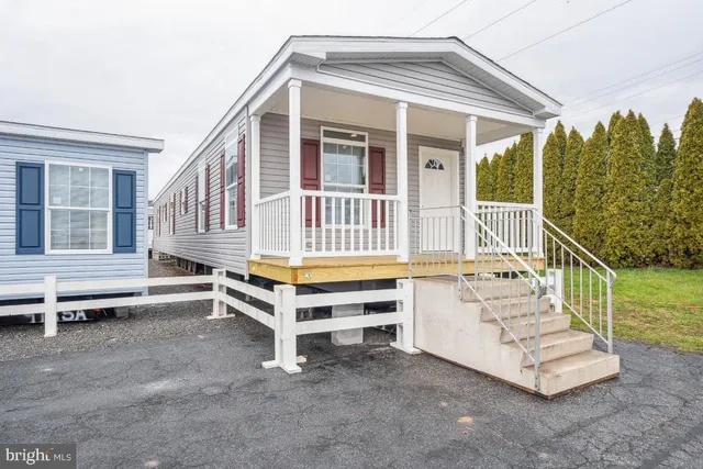 a front view of a house with a balcony