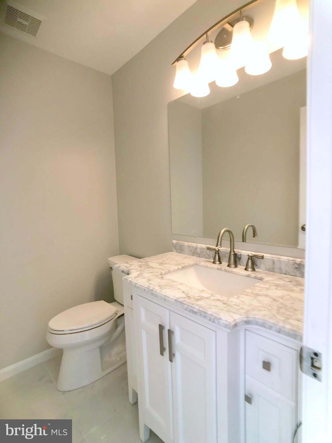 11308 Baritone Court Silver Spring, MD 20901 - Photo 24 of 56 Powder room in main level