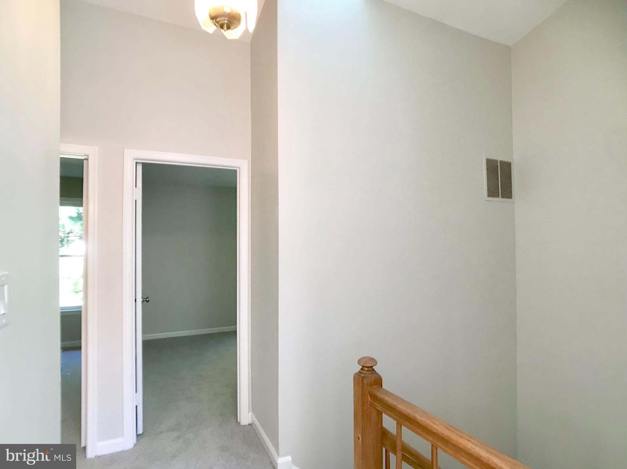 11308 Baritone Court Silver Spring, MD 20901 - Photo 25 of 56 Upped hallway leading to bedrooms
