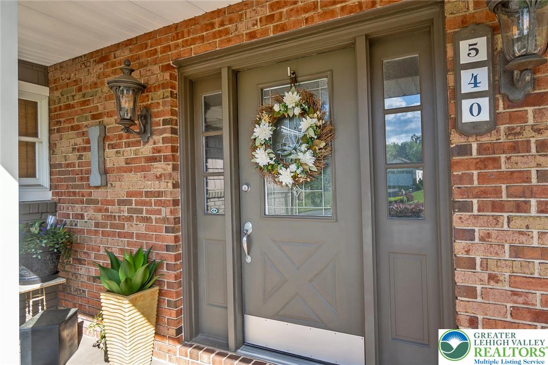 540 Briar Road Pen Argyl, PA 18072 - Photo 7 of 66 A welcoming entry, with a robust door and brick construction