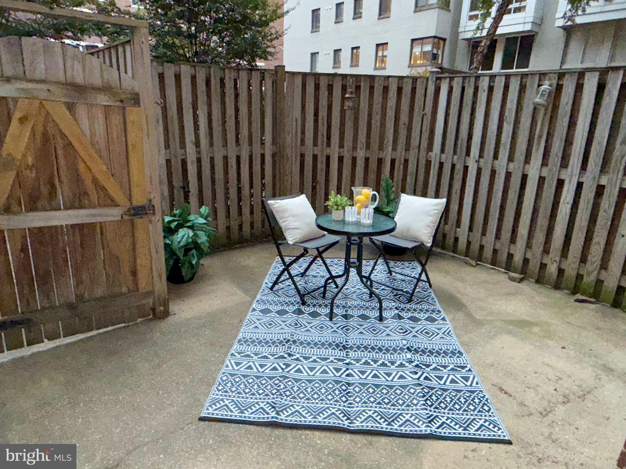 1245 13th Street Northwest, Unit 109 Washington, DC 20005 - Photo 23 of 25 a view of outdoor sitting area with furniture