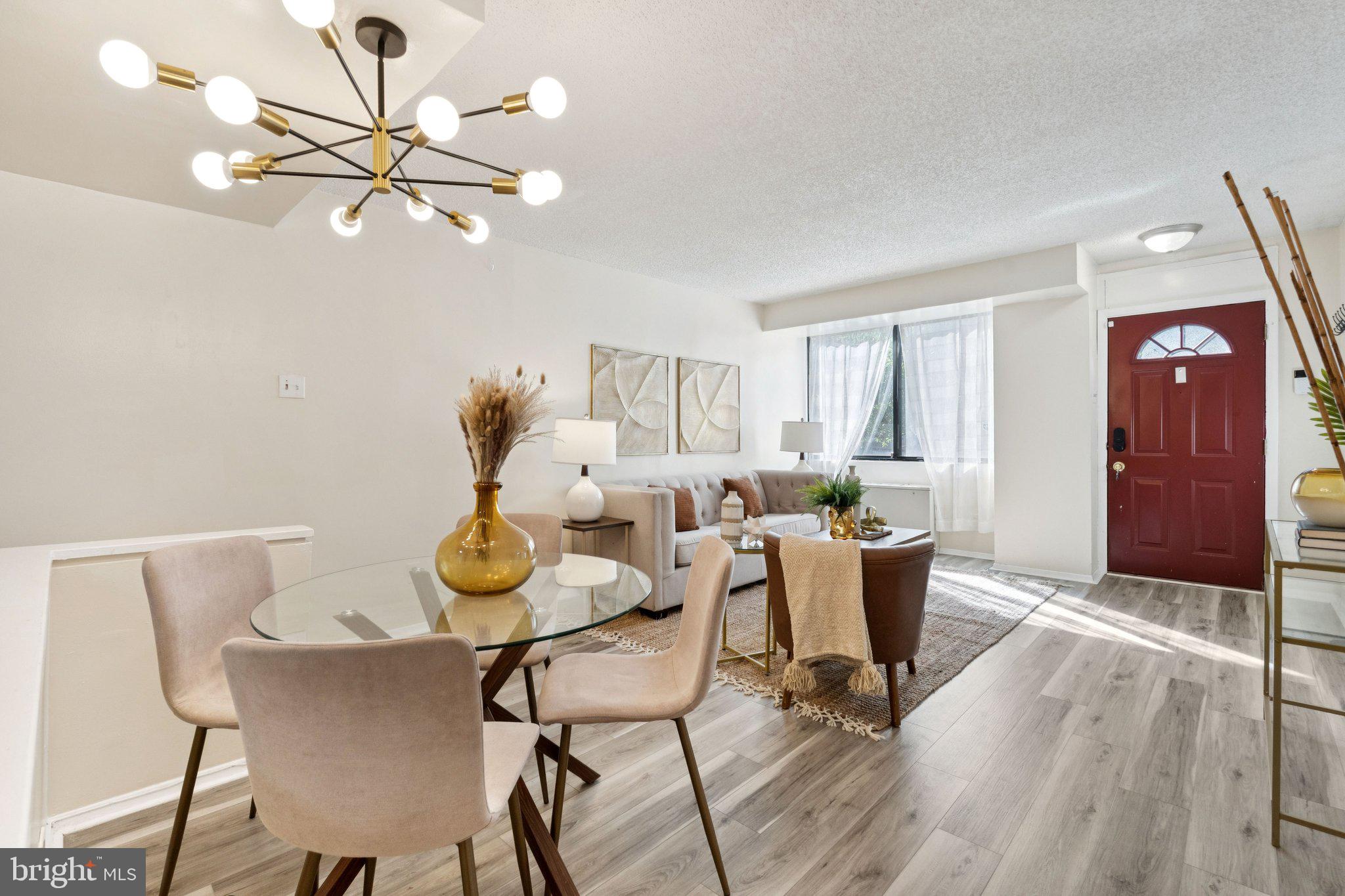 1245 13th Street Northwest, Unit 109 Washington, DC 20005 - Photo 5 of 25 a dining room with furniture and window