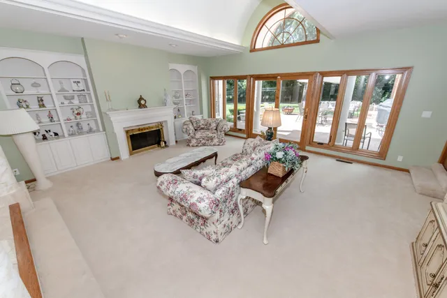 a bathroom with a sink a mirror and a shower