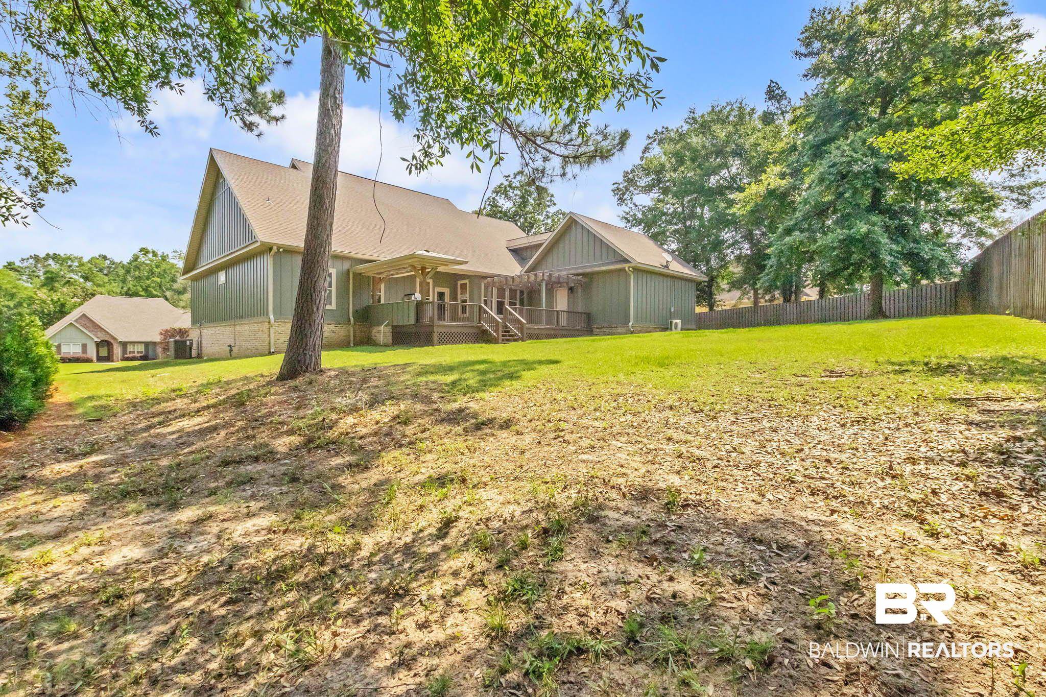 7854 Raegan Lane Daphne, AL 36527 - Photo 54 of 70 Rear view of house with a deck