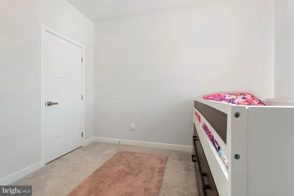 a utility room with cabinets