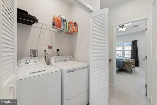 a view of a balcony with chairs