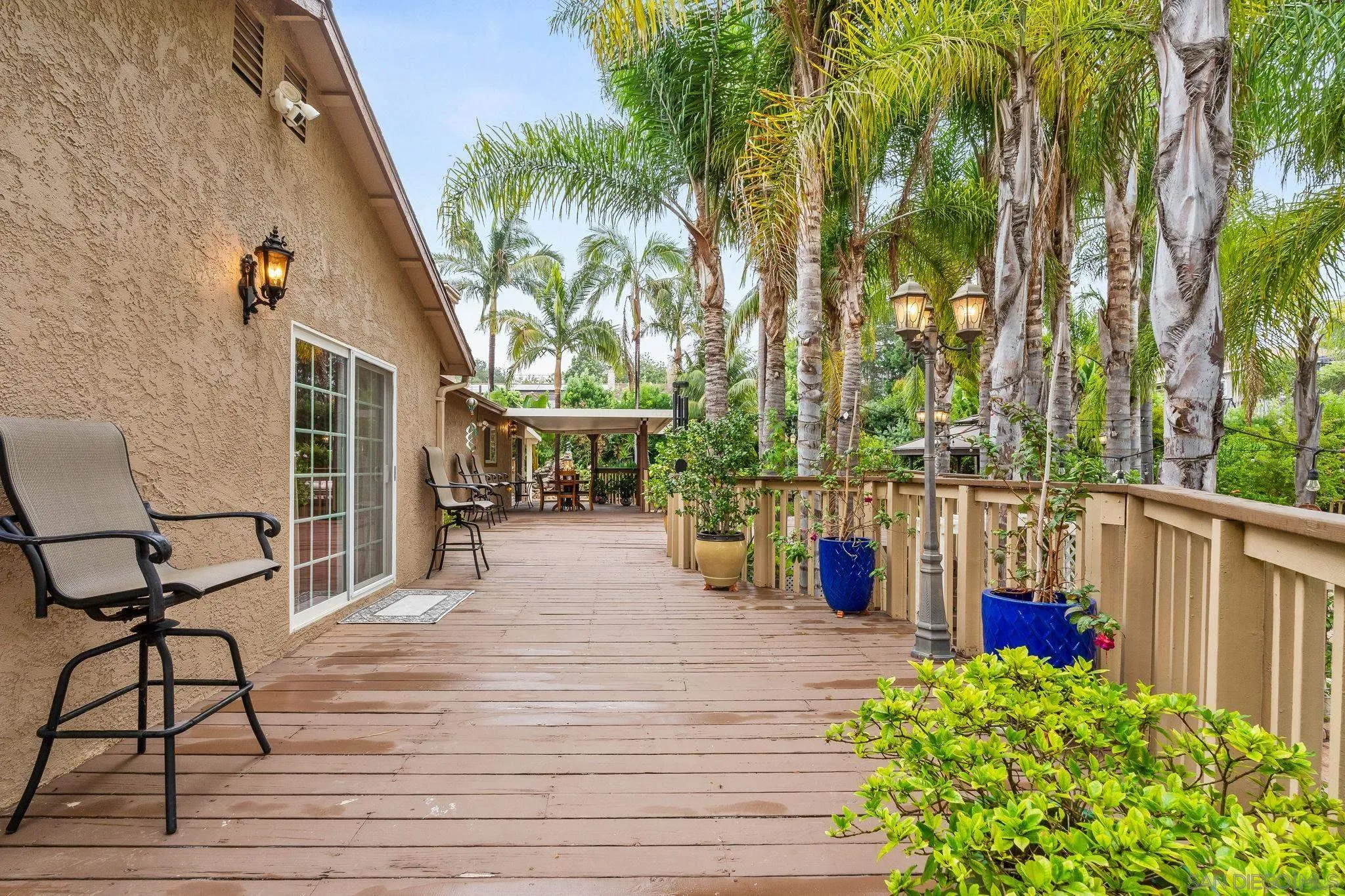 1451 Vía Lima Fallbrook, CA 92028 - Photo 33 of 41 a balcony with wooden floor table and chairs