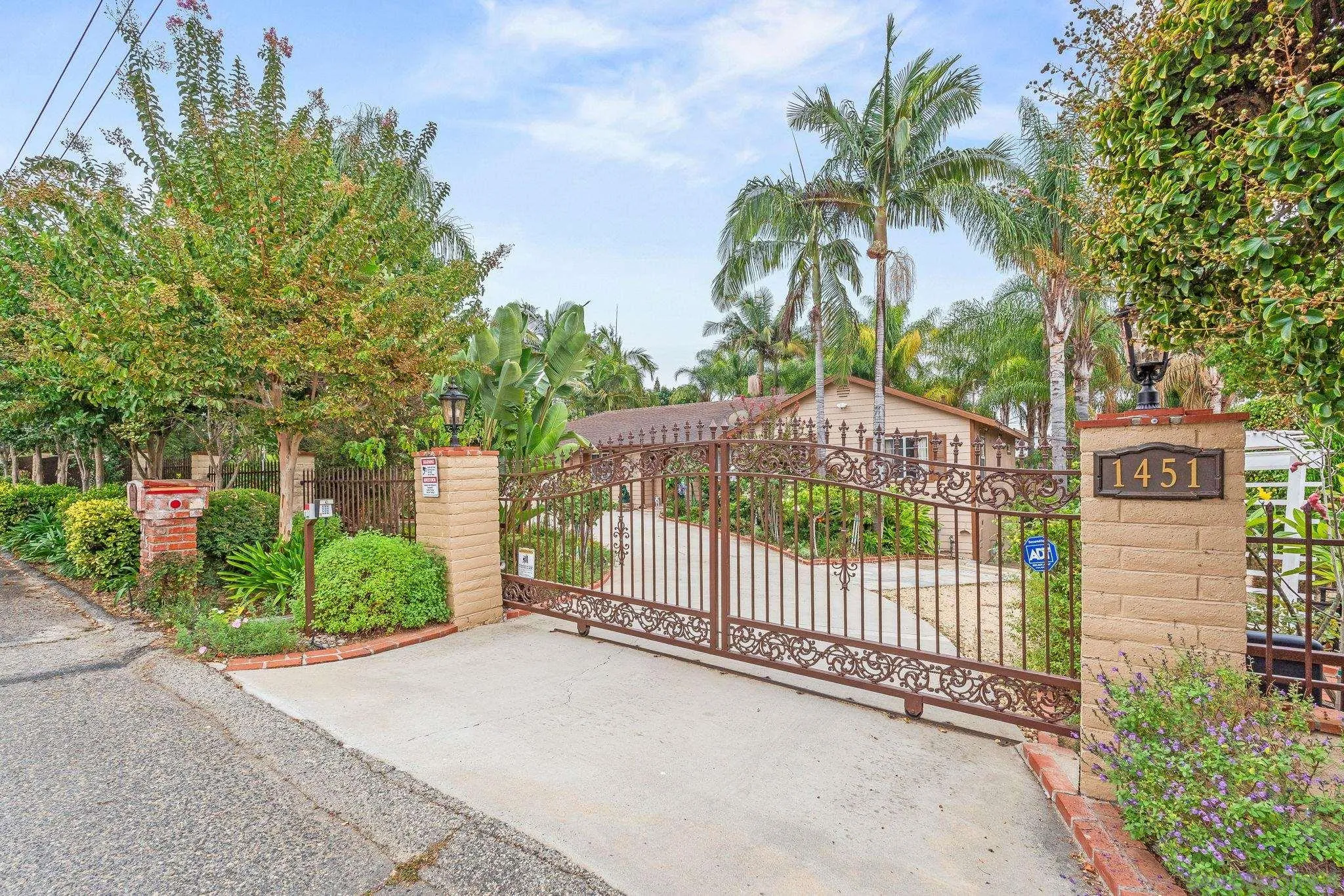1451 Vía Lima Fallbrook, CA 92028 - Photo 4 of 41 a view of a backyard with a garden