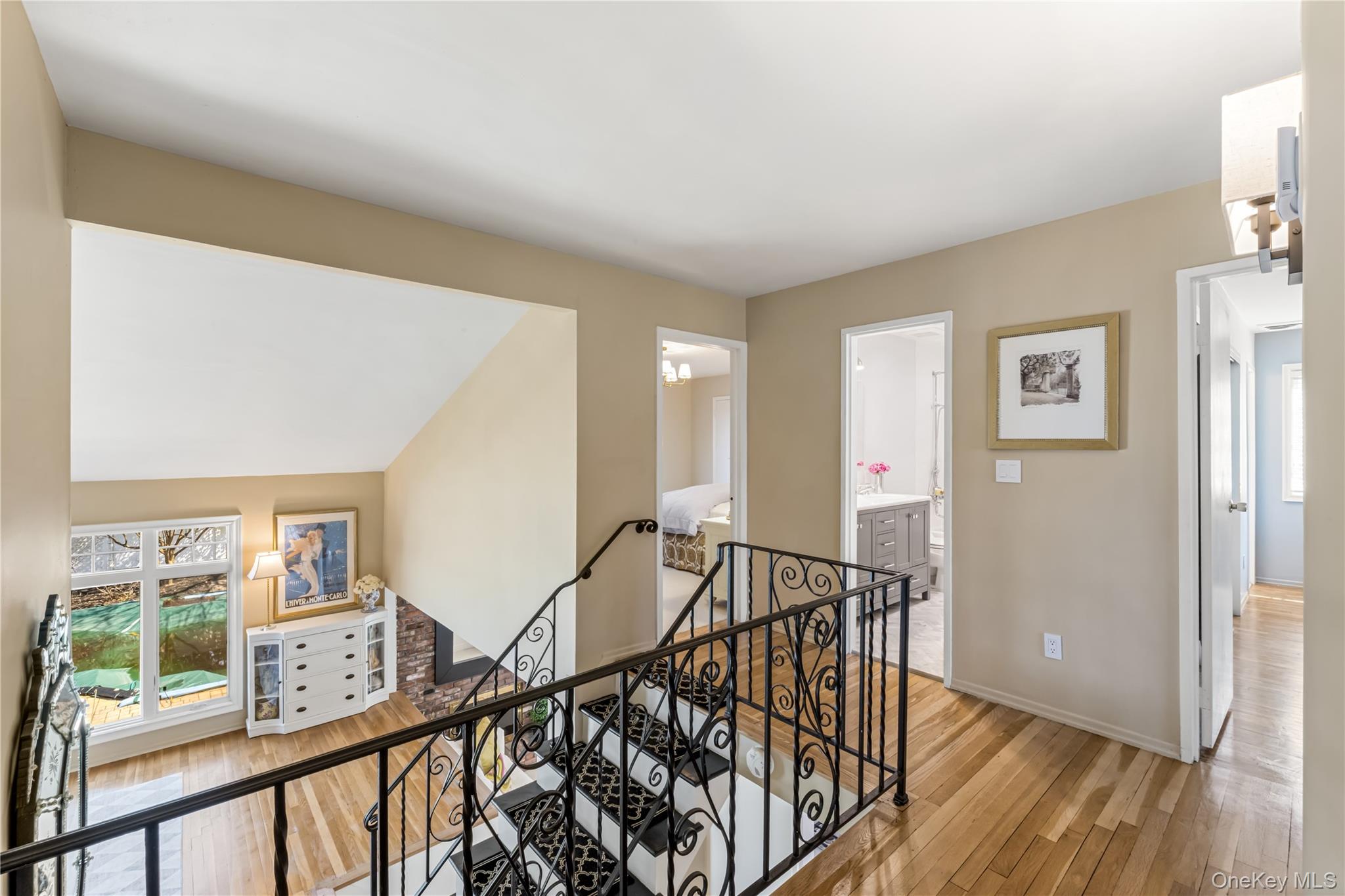 22 Delaware Avenue Jericho, NY 11753 - Photo 21 of 35 a view of an entryway with wooden floor and windows