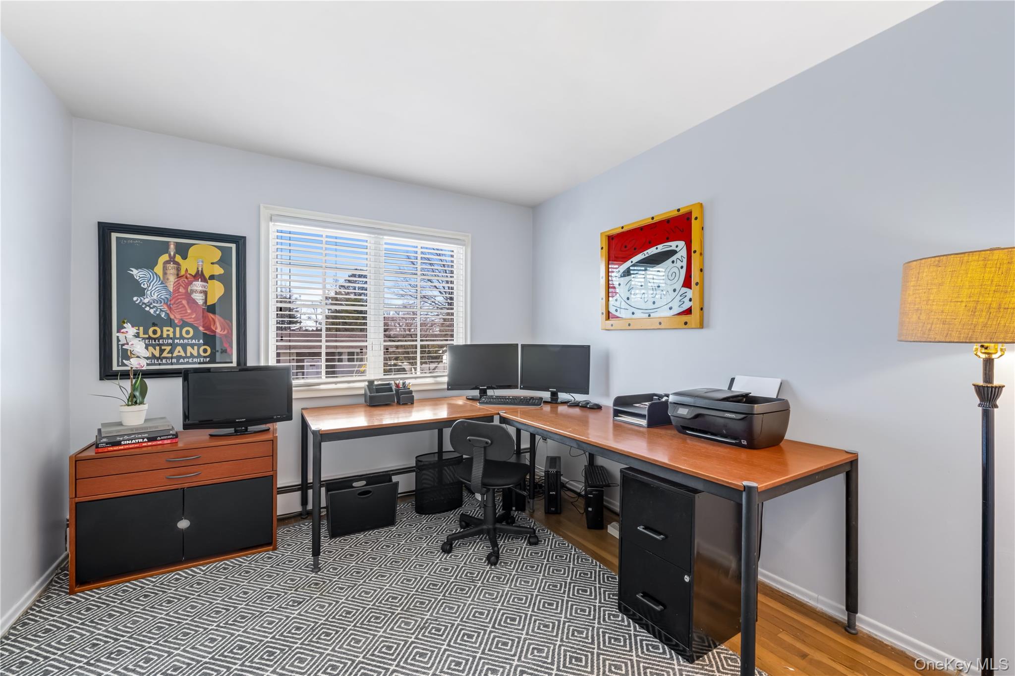 22 Delaware Avenue Jericho, NY 11753 - Photo 27 of 35 a view of a workspace with furniture and a window