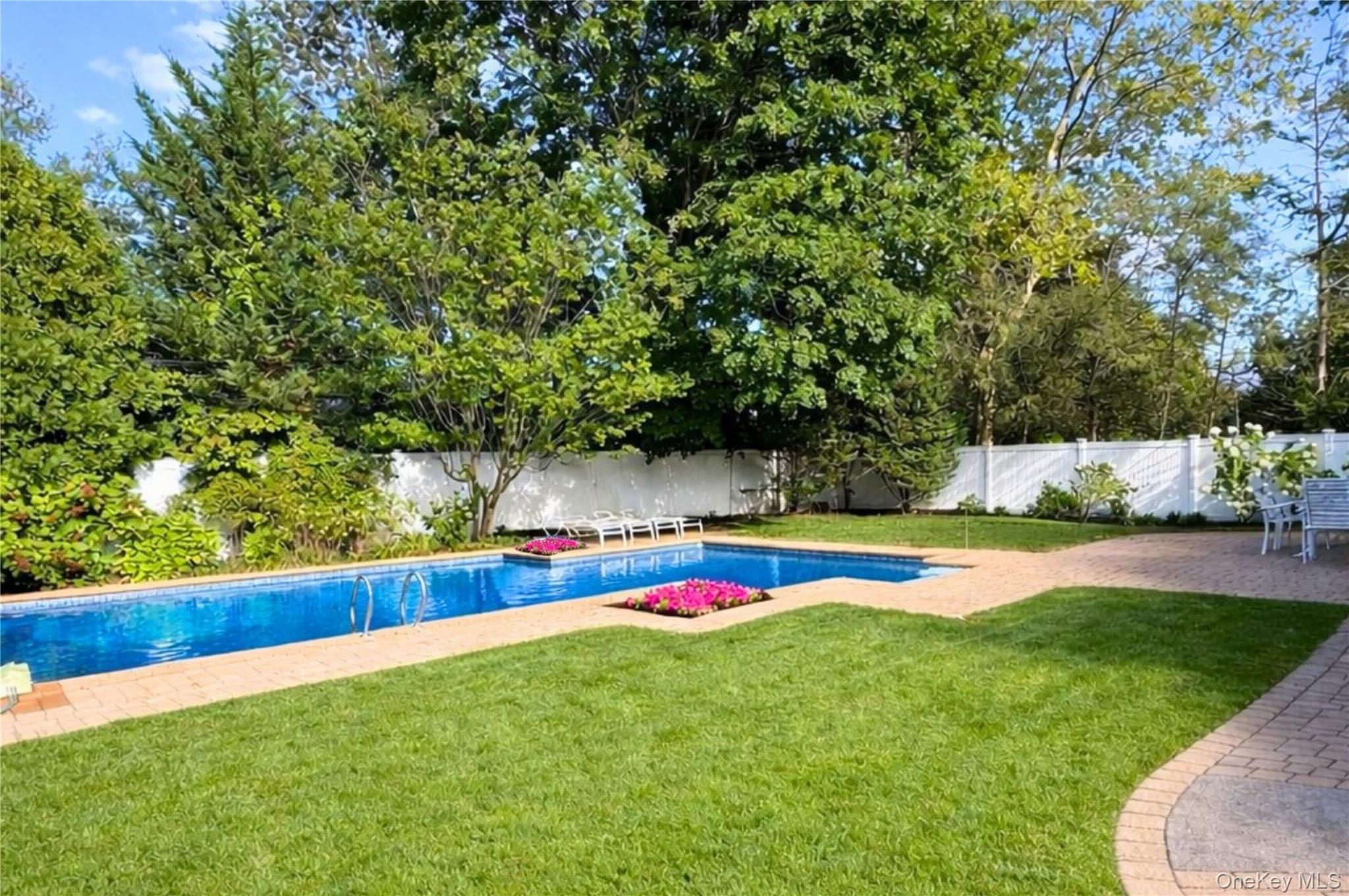 22 Delaware Avenue Jericho, NY 11753 - Photo 31 of 35 a view of swimming pool with lounge area