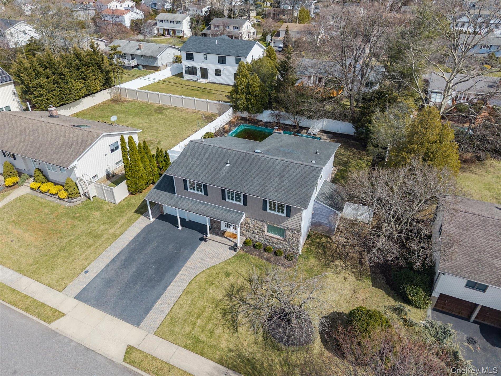 22 Delaware Avenue Jericho, NY 11753 - Photo 35 of 35 an aerial view of a house with a yard basket ball court and outdoor seating