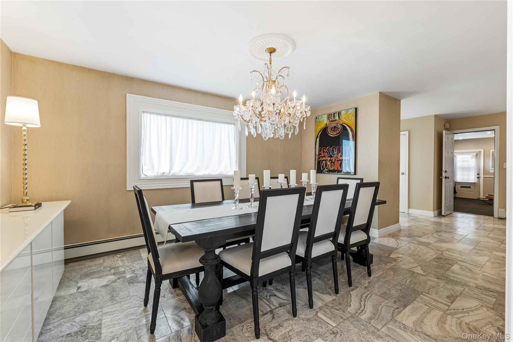 22 Delaware Avenue Jericho, NY 11753 - Photo 9 of 35 a view of a dining room with furniture and chandelier