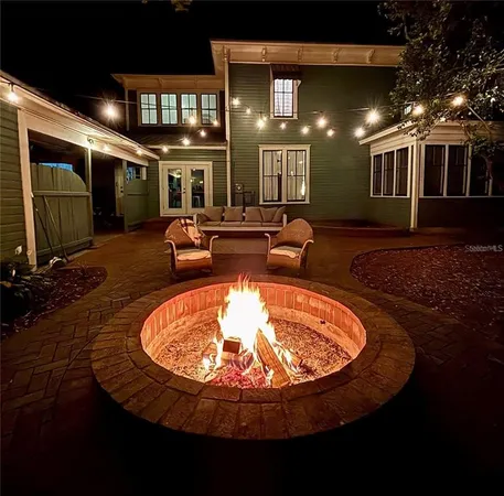 a stove top oven sitting inside of a kitchen