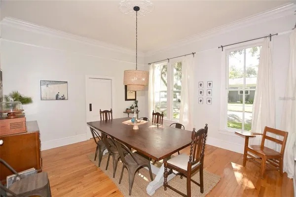 a room with furniture and a book shelf
