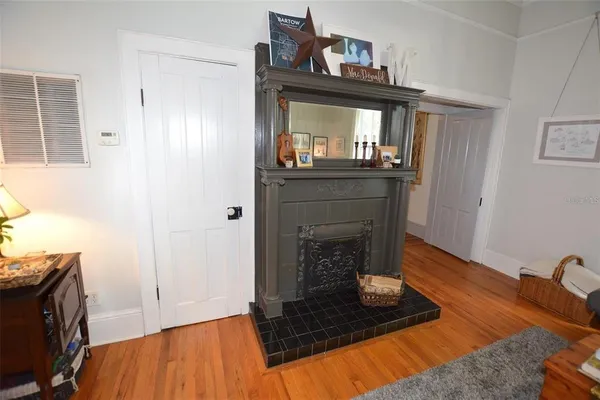 a room with furniture and a book shelf