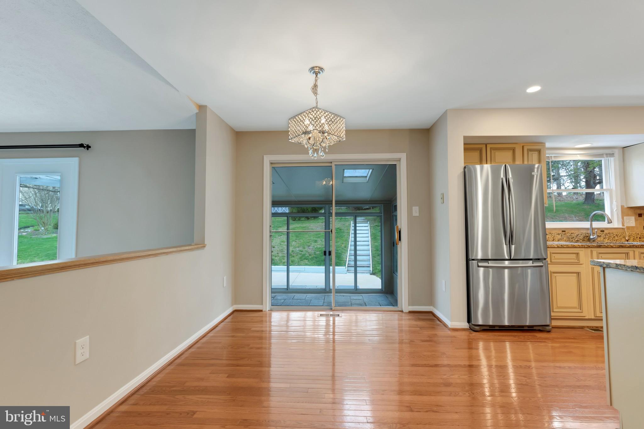 2051 Merrifields Drive Silver Spring, MD 20906 - Photo 8 of 30 Kitchen table space leads to screened porch