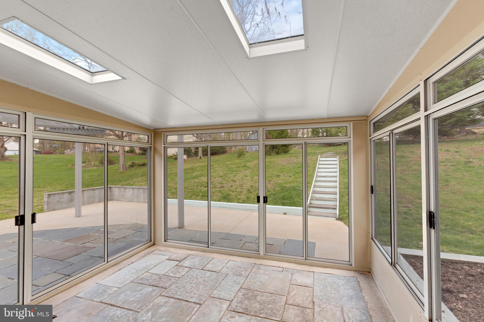 2051 Merrifields Drive Silver Spring, MD 20906 - Photo 9 of 30 Screened porch with two skylights