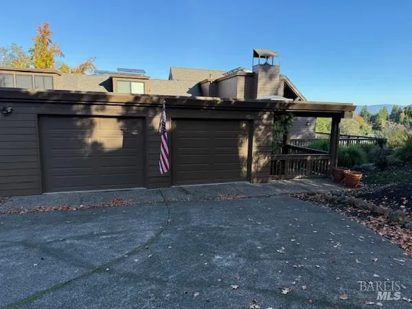 a front view of a house with yard
